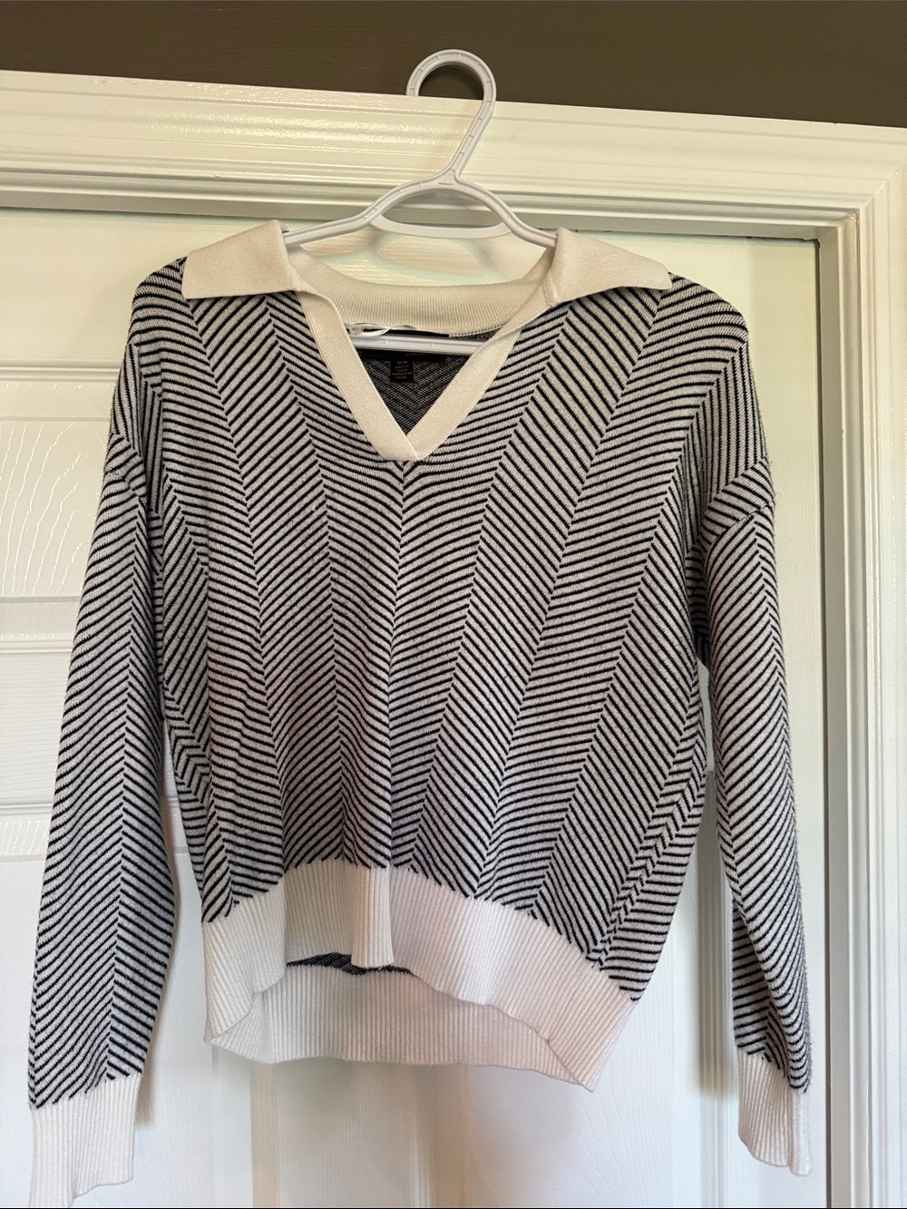 Ivory and Black Chevron V‑Neck Collared Sweater Top